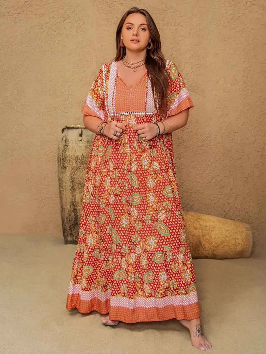 Plus Size Printed Tie Neck Flutter Sleeve Maxi Dress